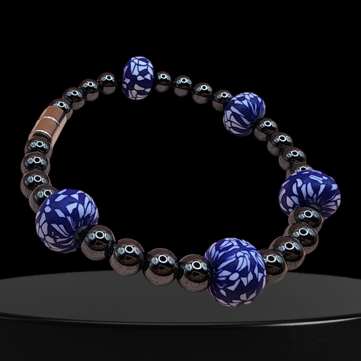 HEMATITE MAGNETIC BRACELET WITH ROUND BLUE/WHITE BEADS