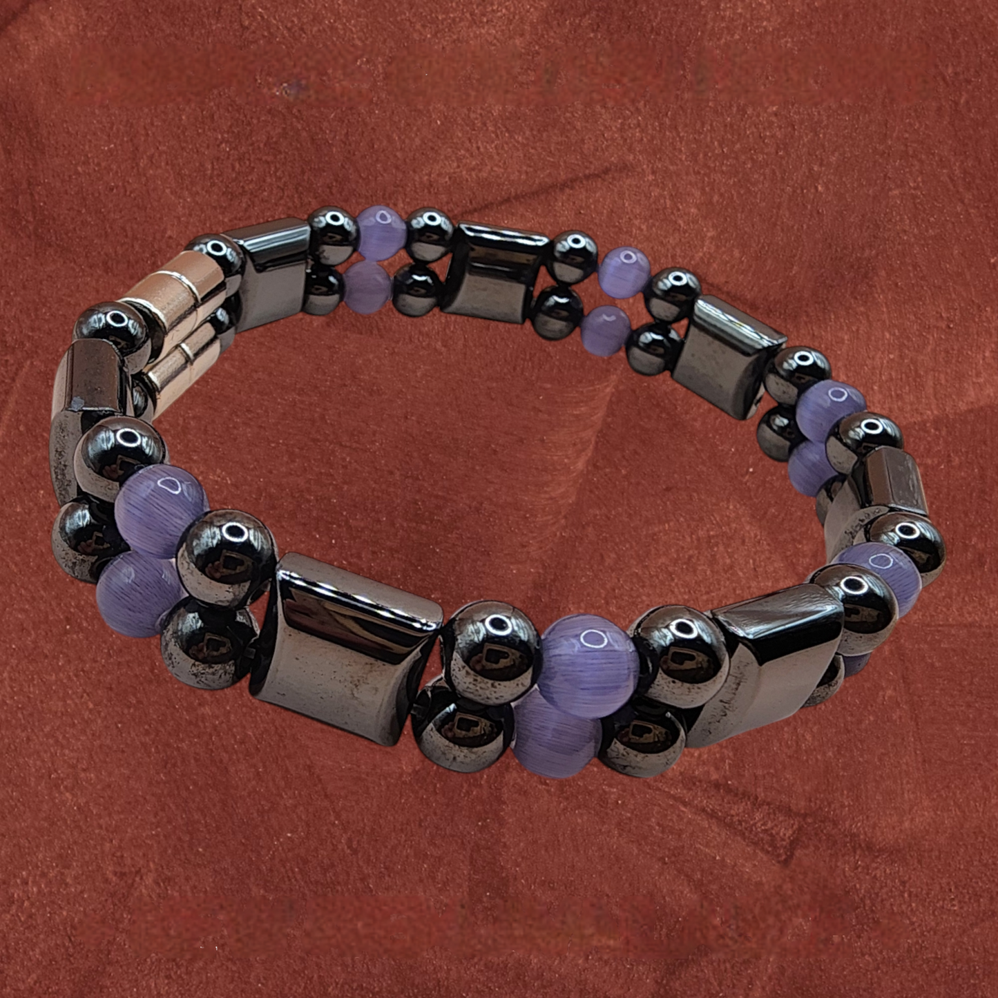 DOUBLE STRAND HEMATITE MAGNETIC BRACELET WITH PURPLE BEADS
