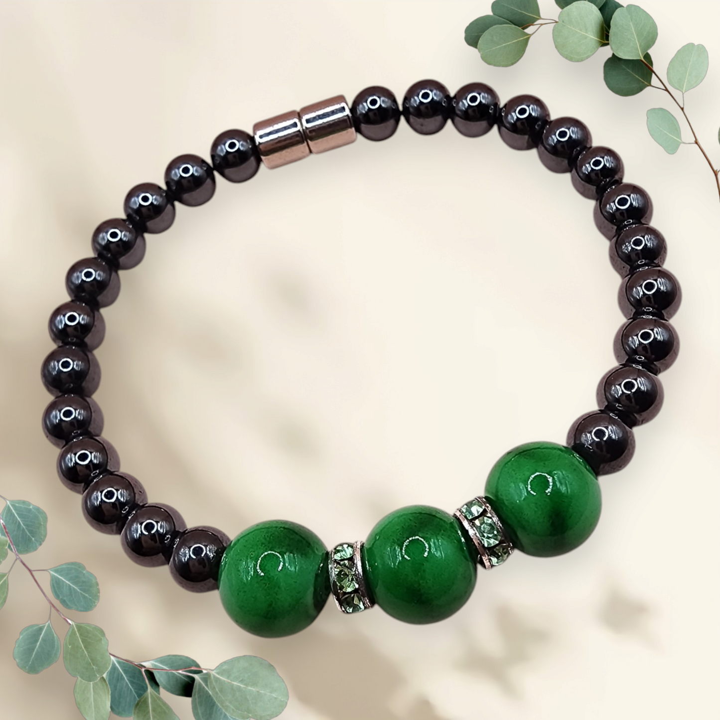HEMATITE MAGNETIC BRACELET WITH GREEN/GOLD BEADS