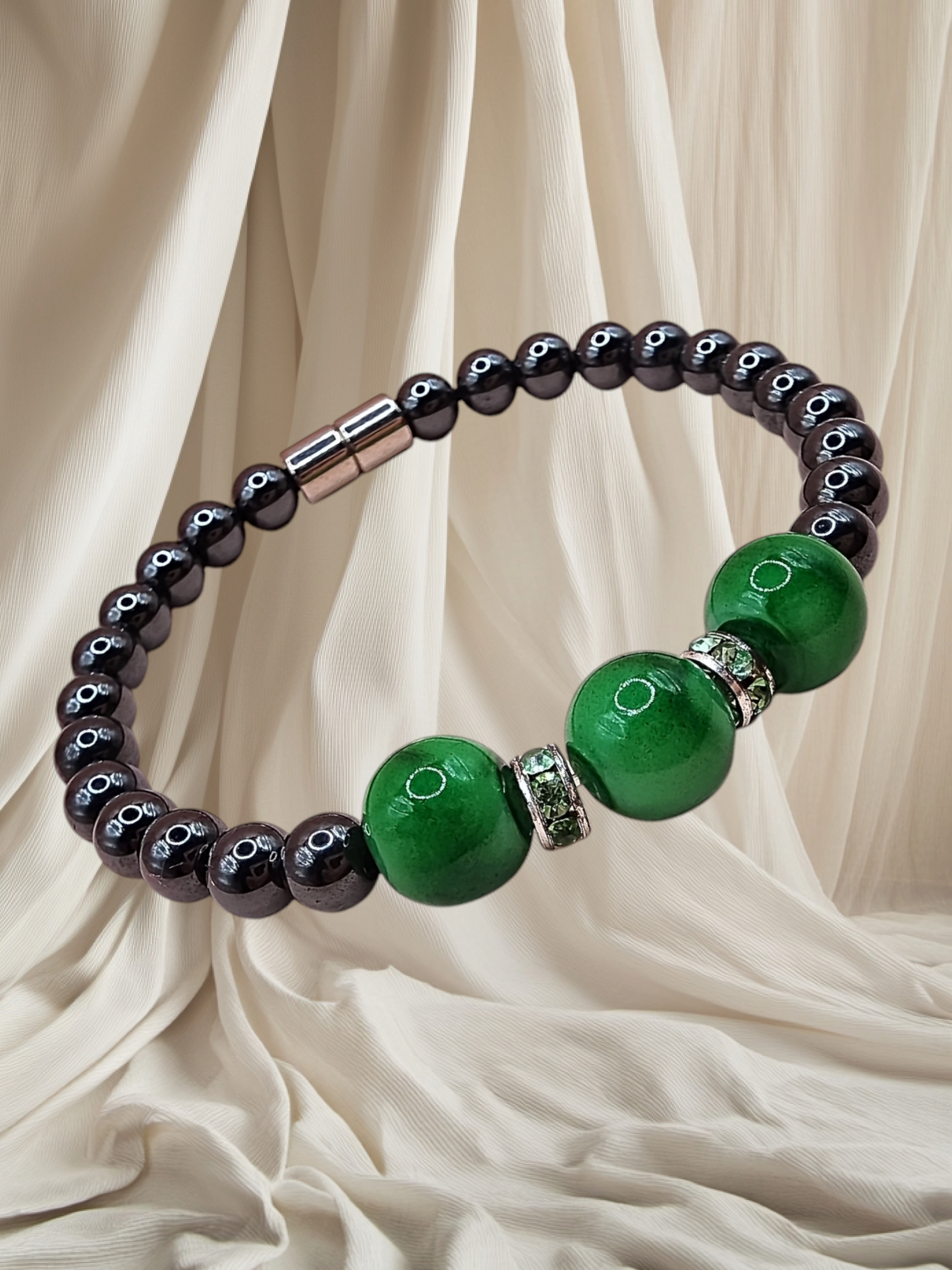 HEMATITE MAGNETIC BRACELET WITH GREEN/GOLD BEADS