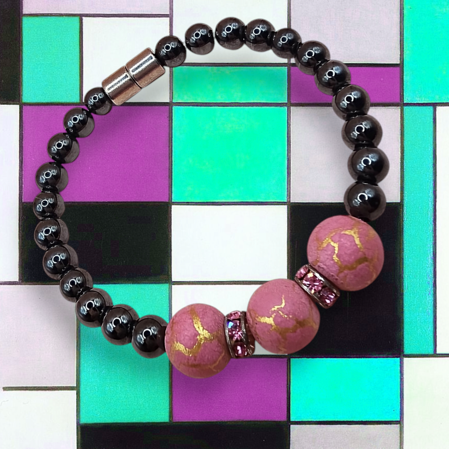 HEMATITE MAGNETIC BRACELET WITH PINK/GOLD ROUND BEADS & PINK RHINESTONES SPACERS