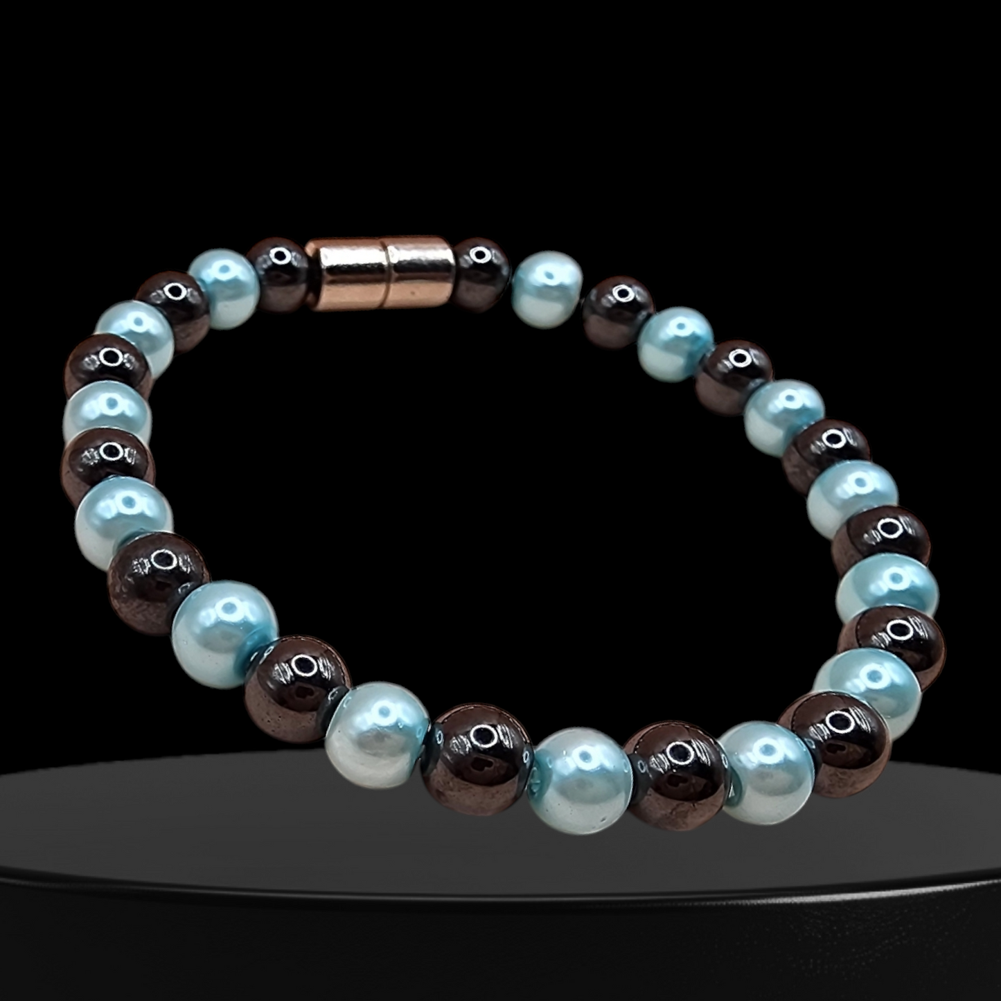 HEMATITE MAGNETIC BRACELET WITH METALIC PINK/BLUE BEADS