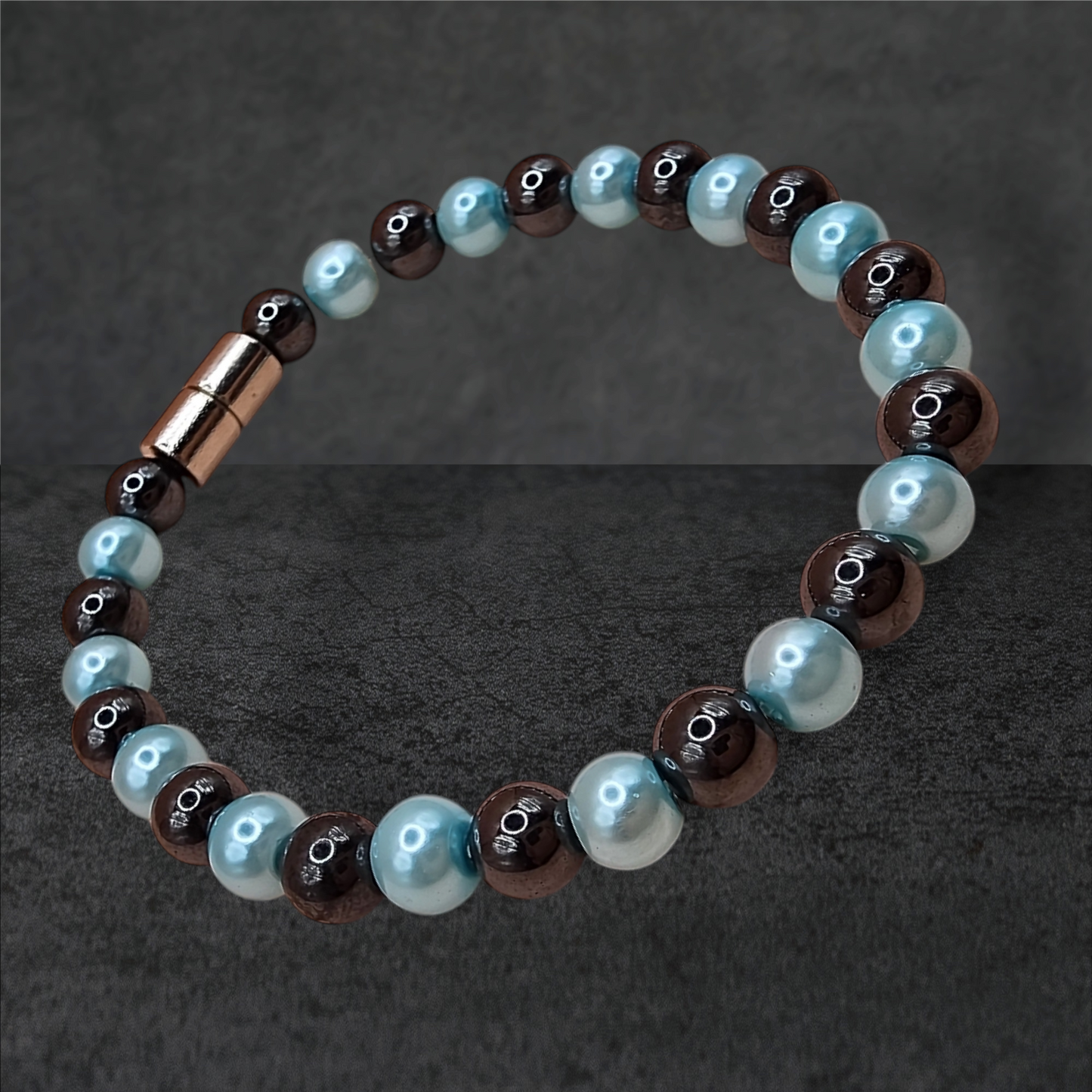 HEMATITE MAGNETIC BRACELET WITH METALIC PINK/BLUE BEADS
