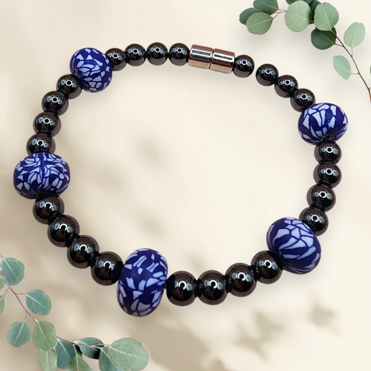 HEMATITE MAGNETIC BRACELET WITH ROUND BLUE/WHITE BEADS